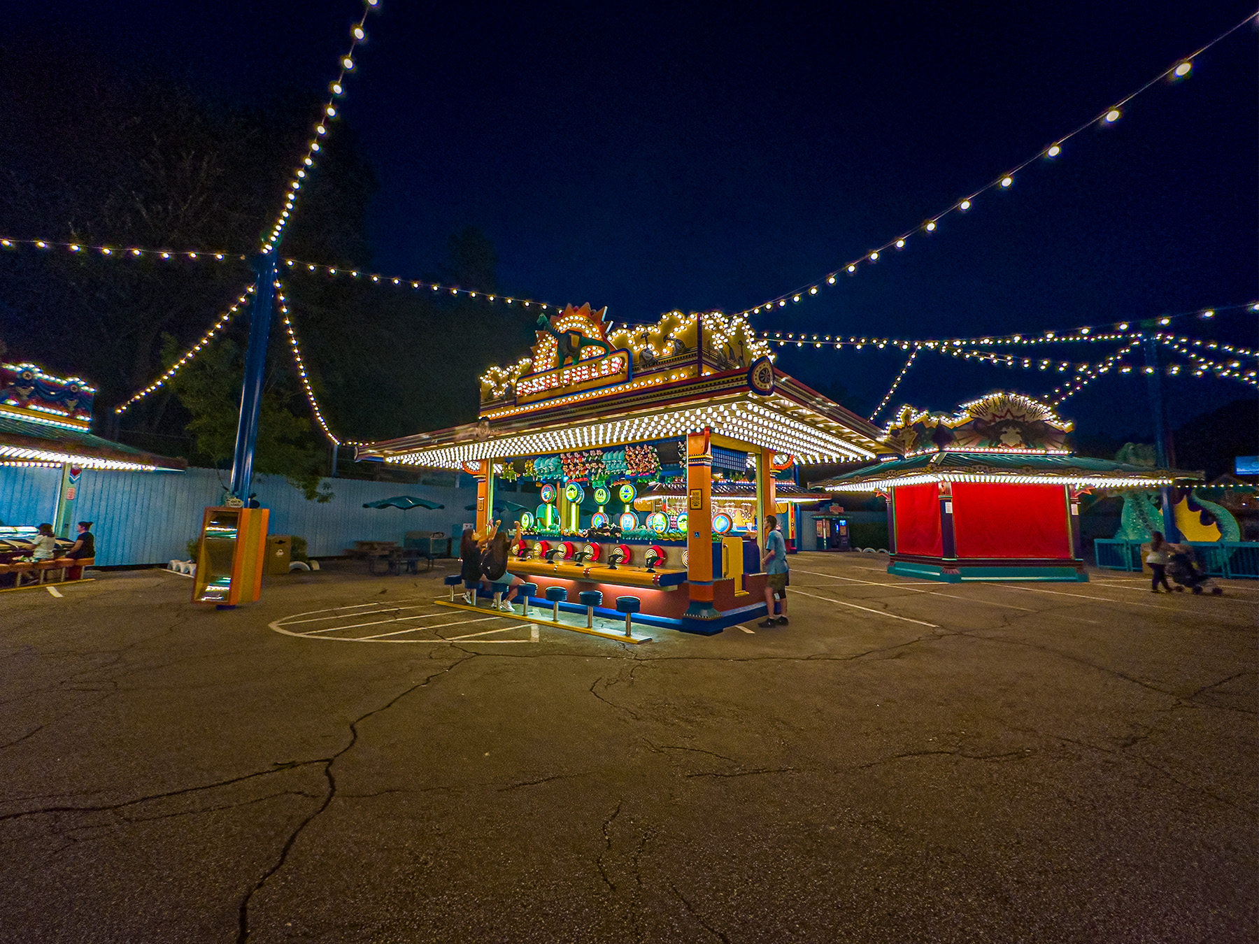A evening photo of Dino Land's Fossil Fueler

          